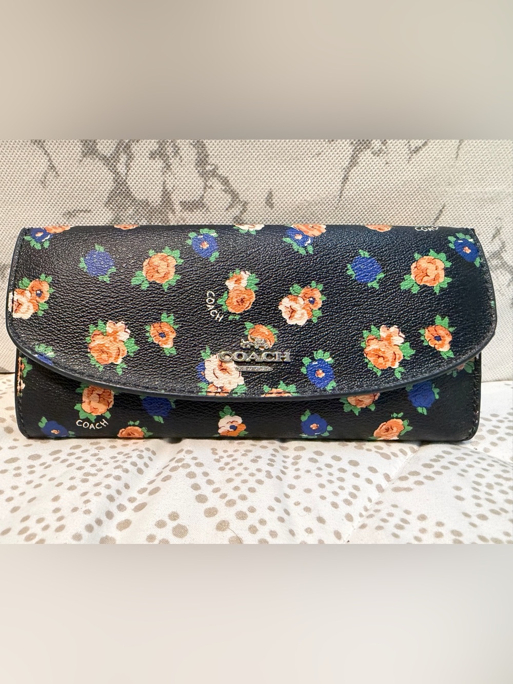 COACH Navy Floral Pebbled Leather Clutch with Orange & Blue Flowers